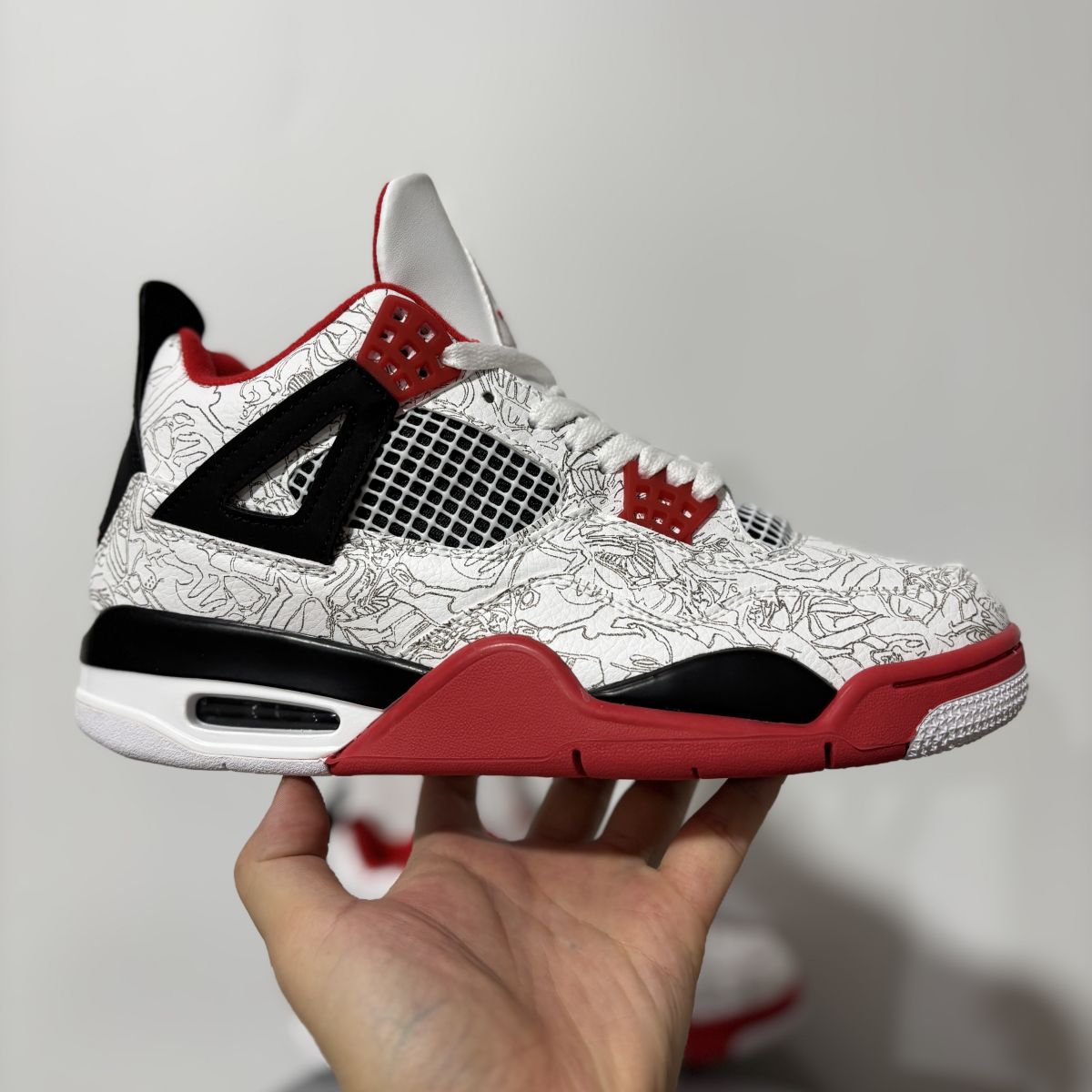 AJ4白红雕刻 Air Jordan 4 Retro Laser 舒适贴合 复古篮球鞋 男女同款 IR2070-100尺码：36-47